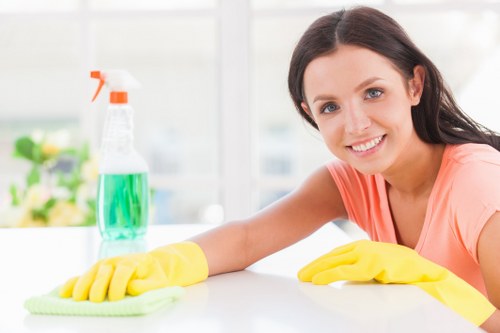 Carpet cleaning team following safe working practices